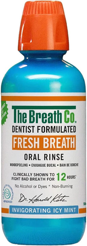 The Breath Co. Fresh Breath Oral Rinse bottle with orange cap and blue label on a white background